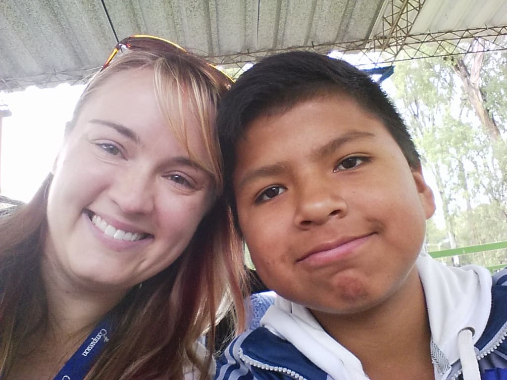 Joasia in a picture with her sponsor child